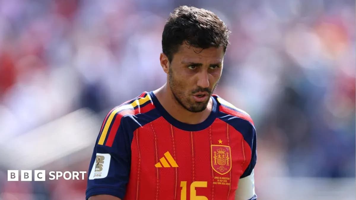 Spain player in red jersey during match