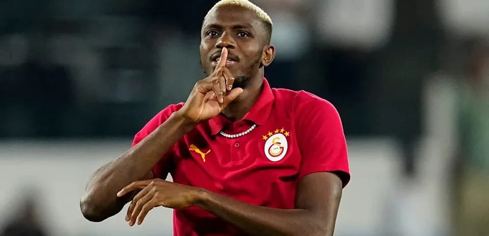 Player gesturing with finger to lips during match