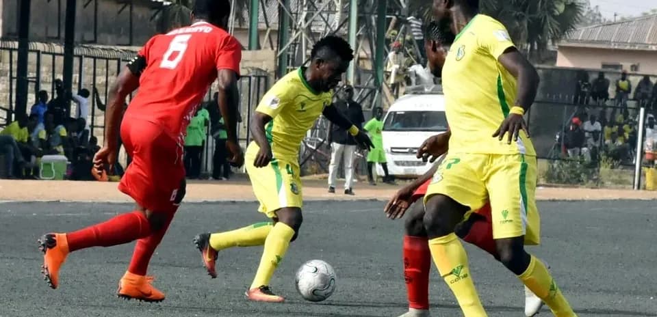 Players competing for the ball during NPFL match