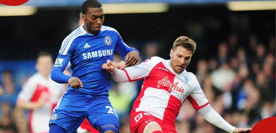 Chelsea player tackling opponent during match
