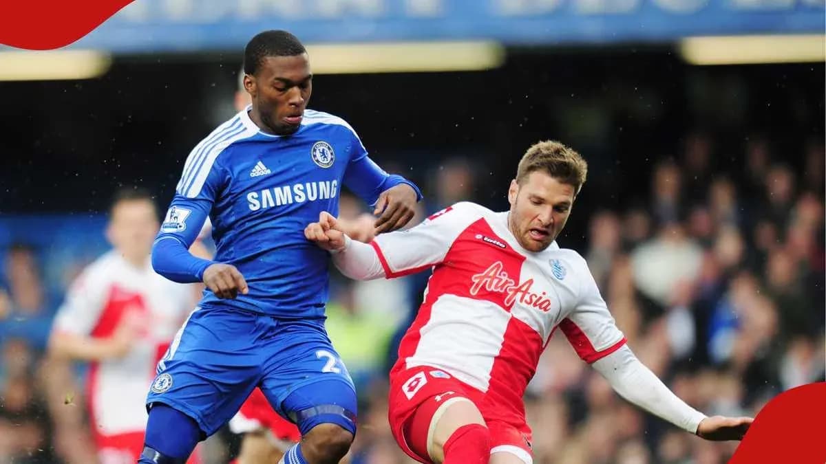 Chelsea player tackling opponent during match