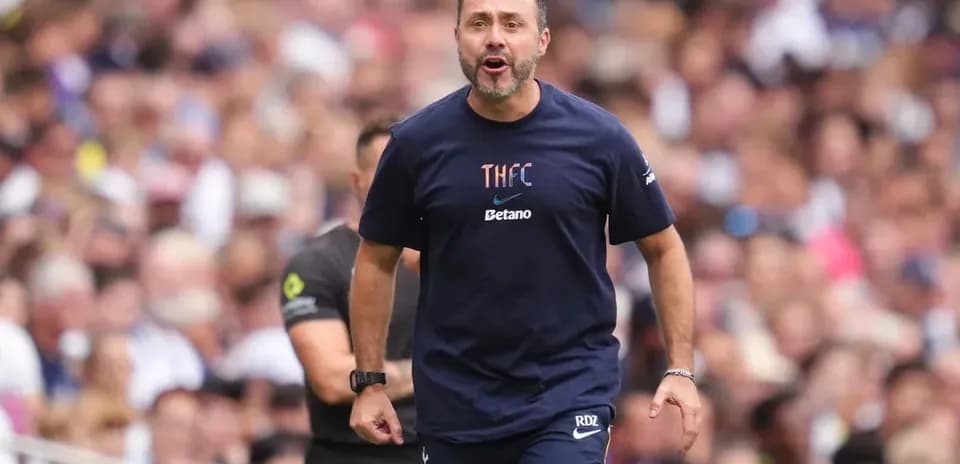 Coach shouting instructions on the sidelines during match