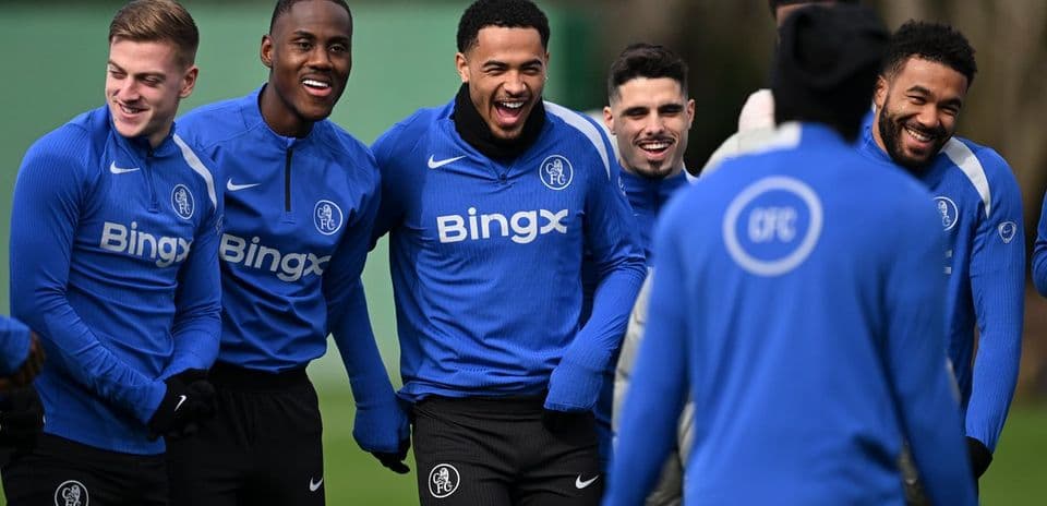 Players laughing during training session at the pitch