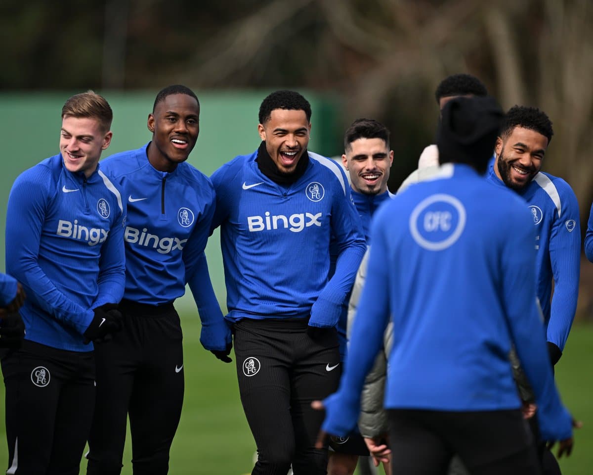 Players laughing during training session at the pitch