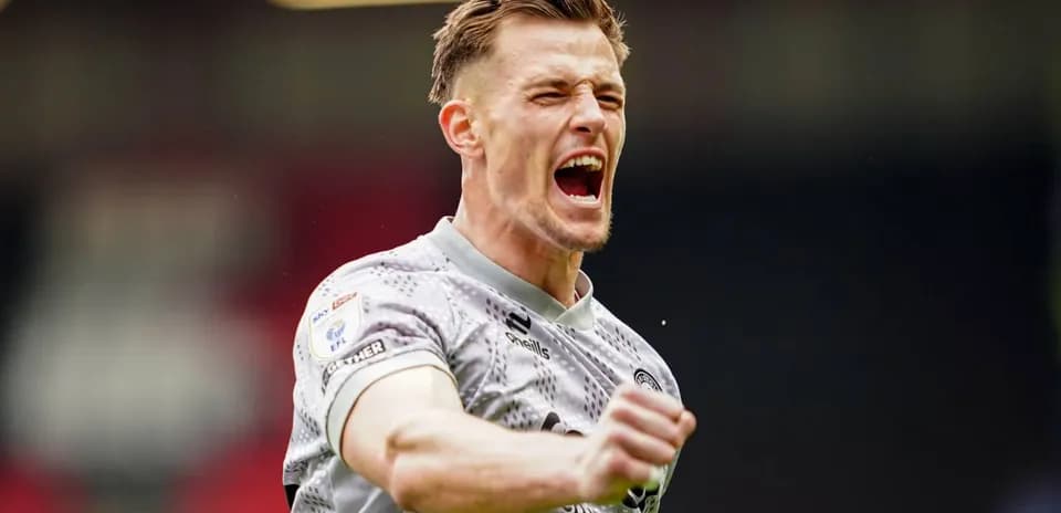 Goalkeeper celebrating after a successful save