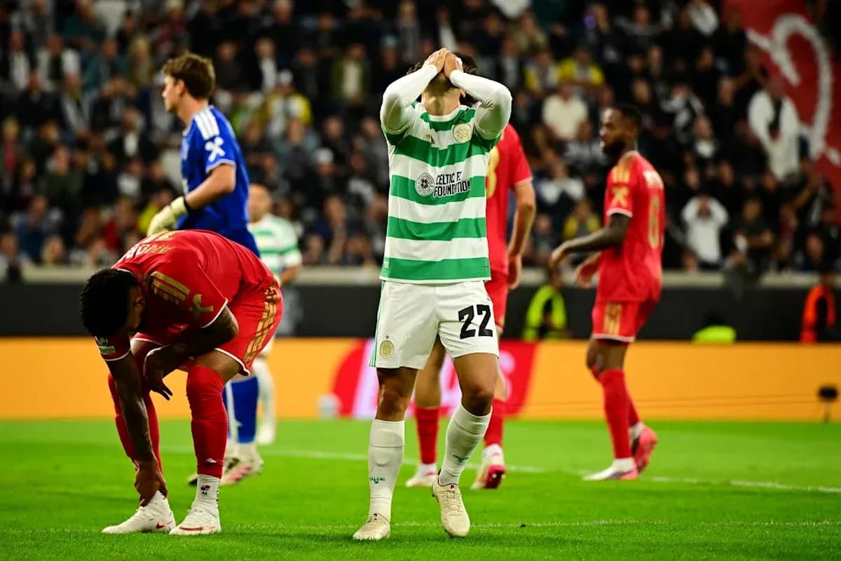 Celtic player reacting after a missed opportunity