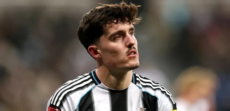 Newcastle United player looking up during match