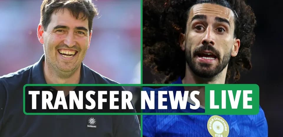 Manager smiling next to player during transfer news segment