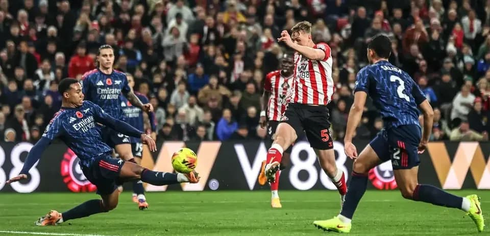 Sunderland player striking ball during match