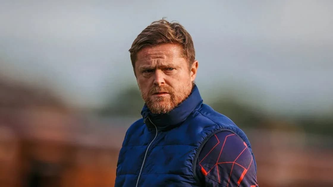 Coach observing during training session outdoors