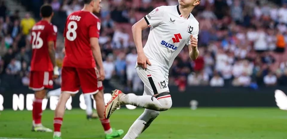 Player celebrating after scoring a goal in match