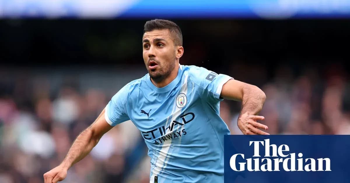 Player in Manchester City kit celebrating during match