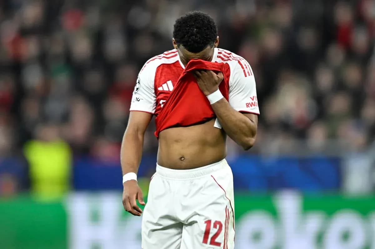 Player holding shirt while walking off field