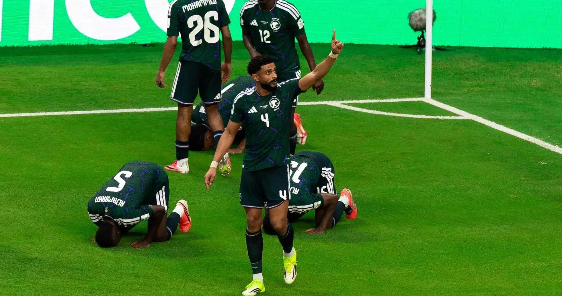 Saudi players celebrating after scoring a goal