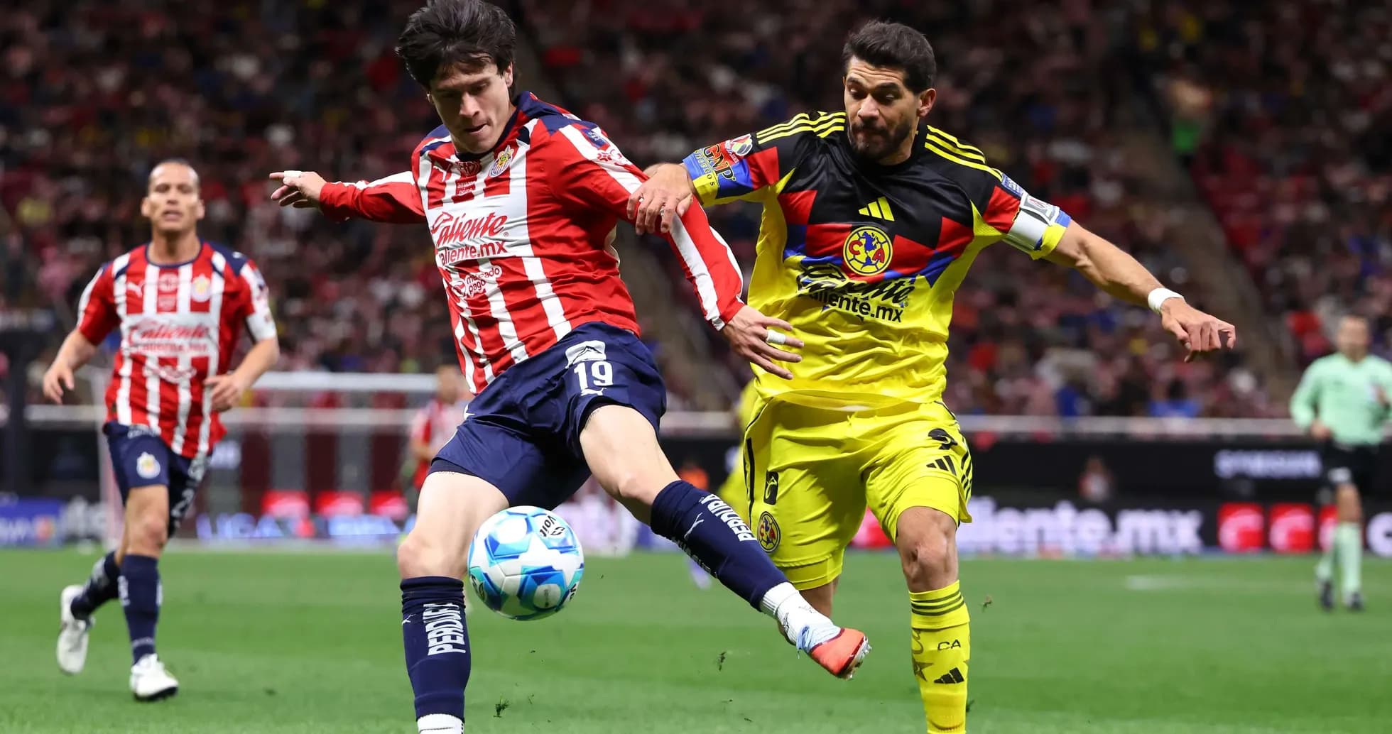 Club America player challenges Guadalajara Chivas striker