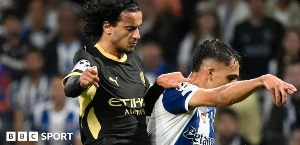 Two players battling for possession during a match