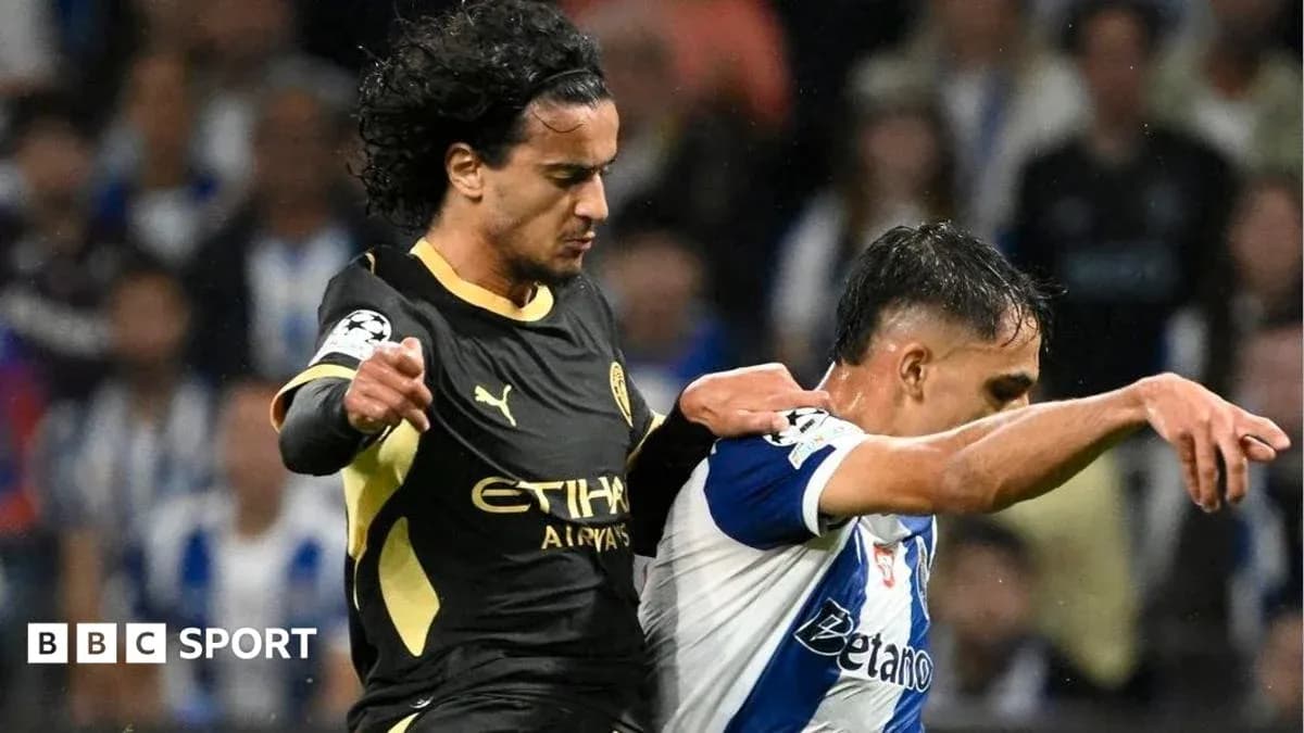 Two players battling for possession during a match