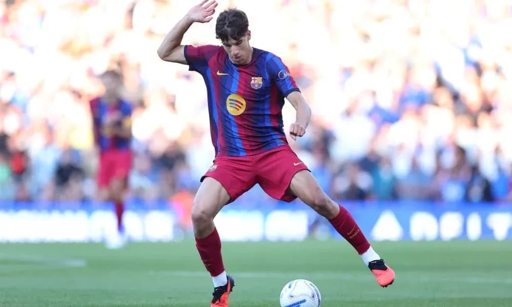 Player in Barcelona kit controlling the ball