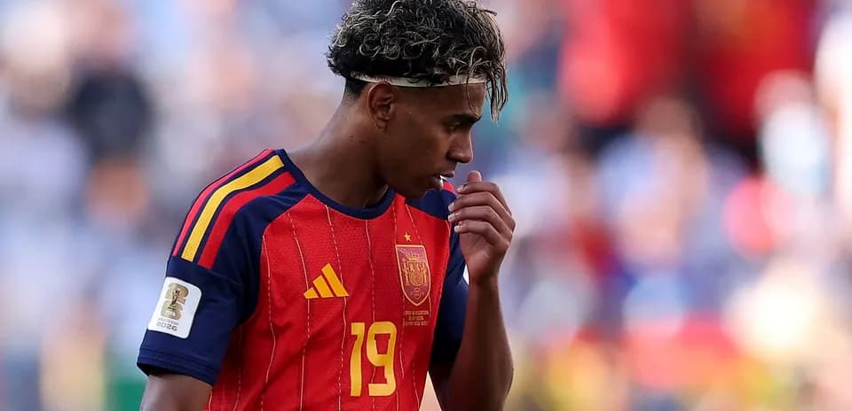 Spain player looking down during match