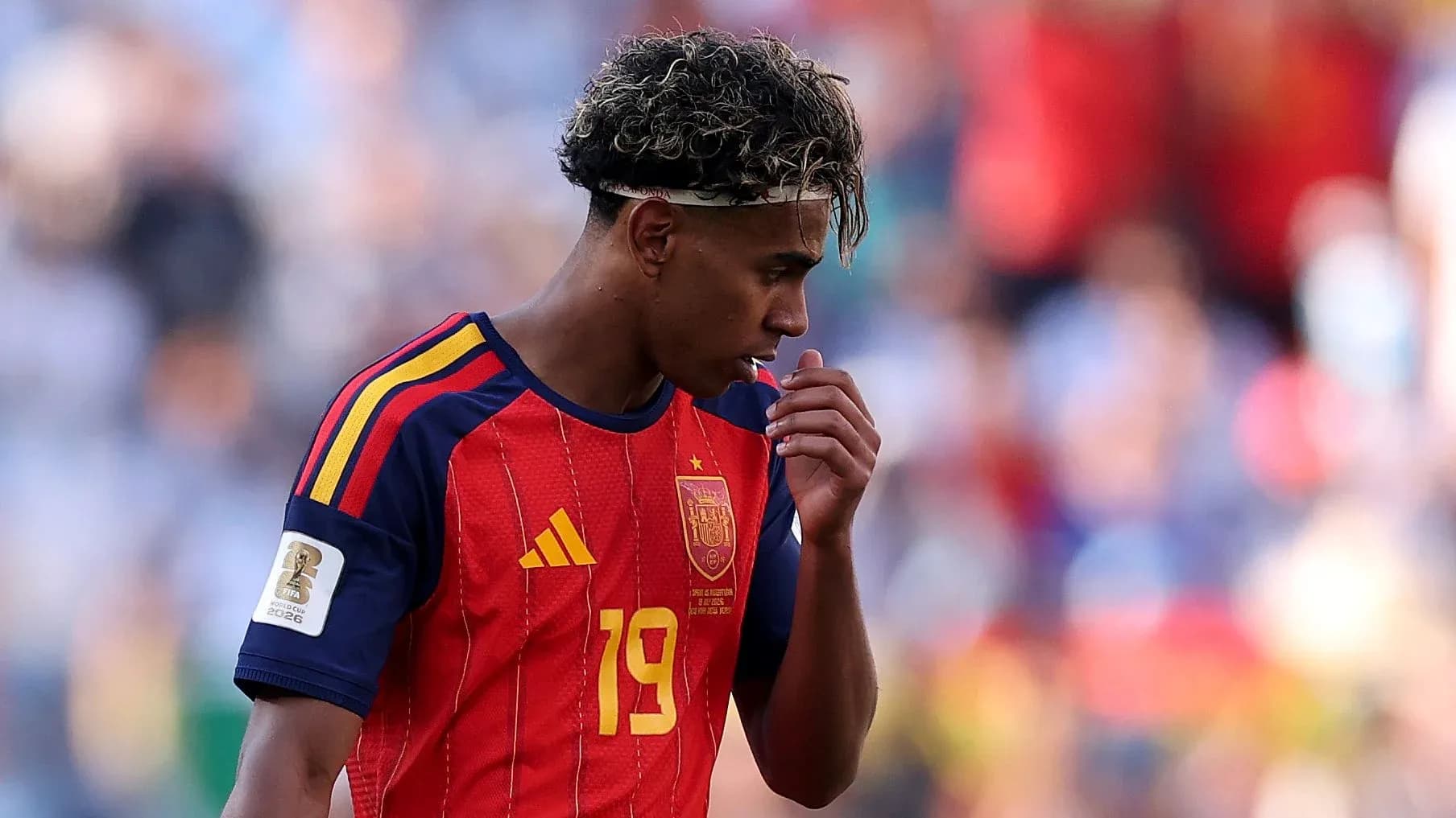 Spain player looking down during match