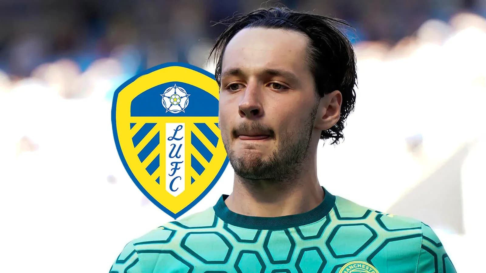 Goalkeeper wearing green jersey with Leeds United logo