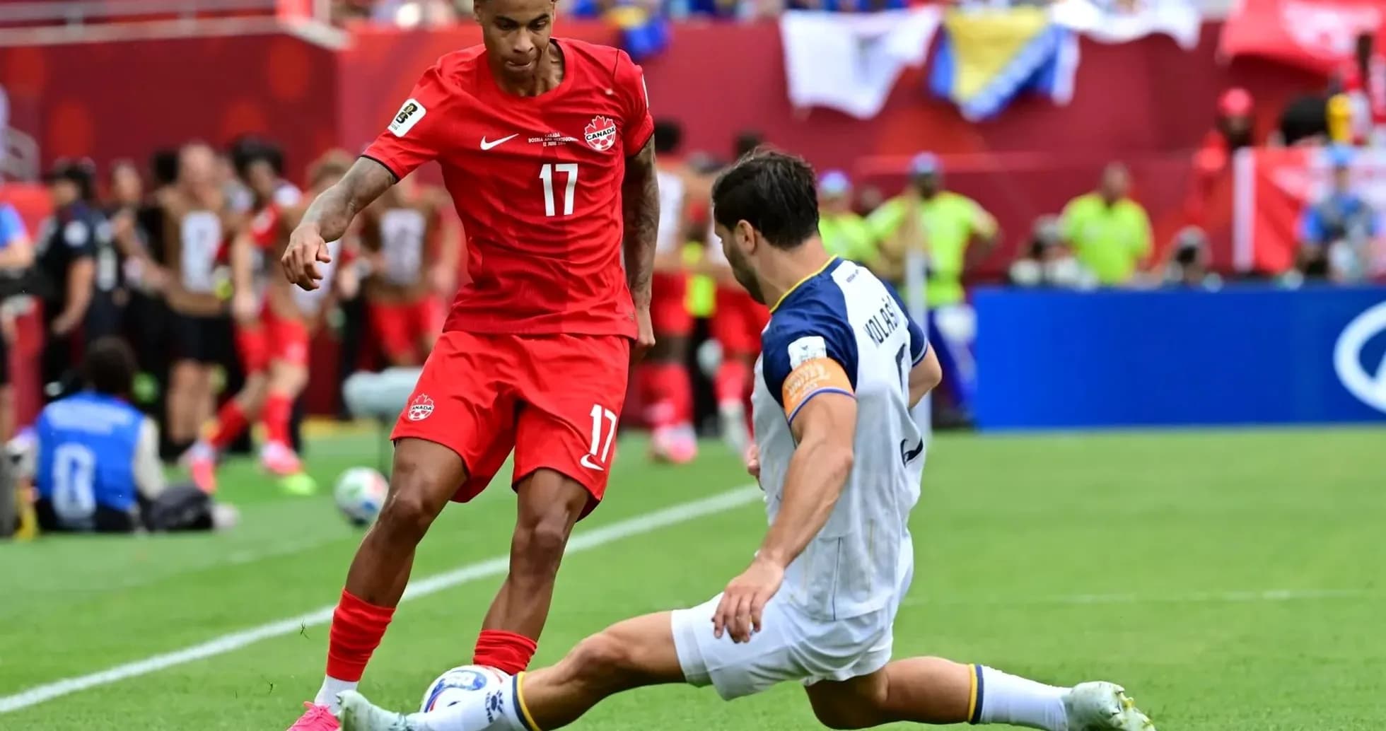 Player dribbling during Canada vs Bosnia match