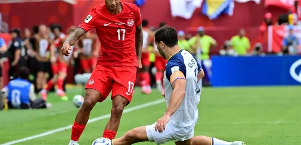 Player dribbling during Canada vs Bosnia match