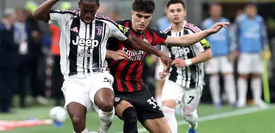 Two players battling for the ball during match