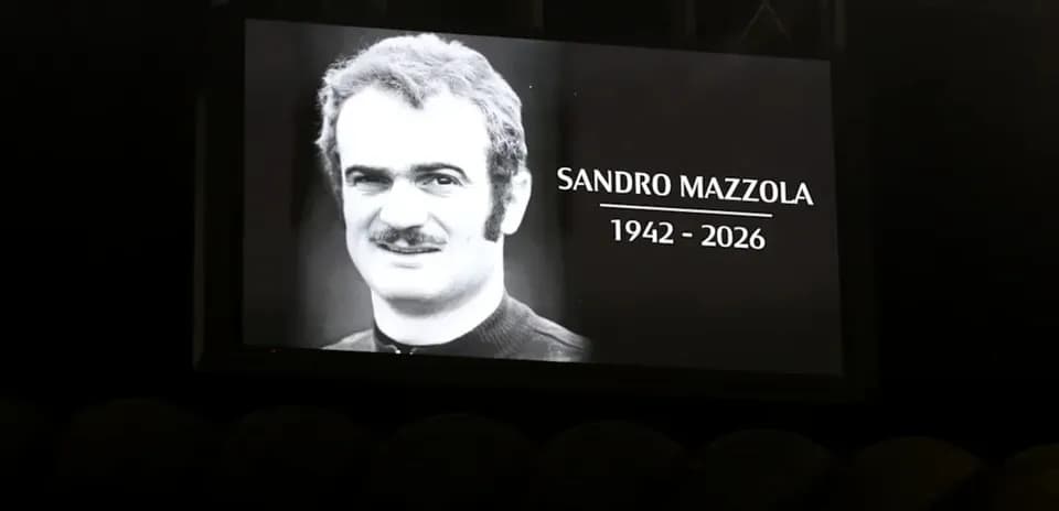 Tribute screen displaying Sandro Mazzola's image and dates