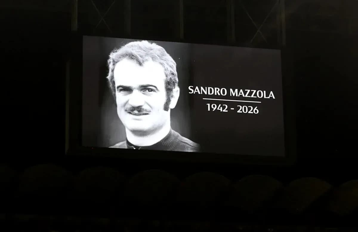 Tribute screen displaying Sandro Mazzola's image and dates