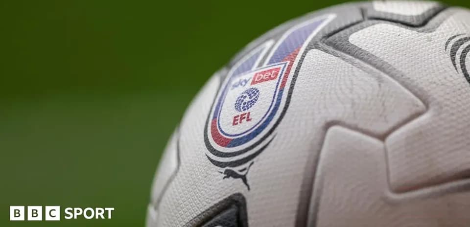 Close-up of EFL branded football on grass