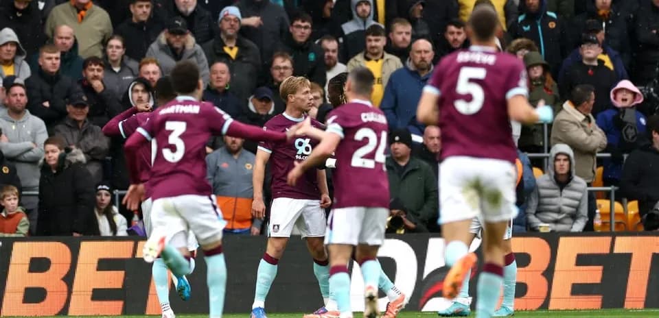 Burnley players celebrating during match against Wolves