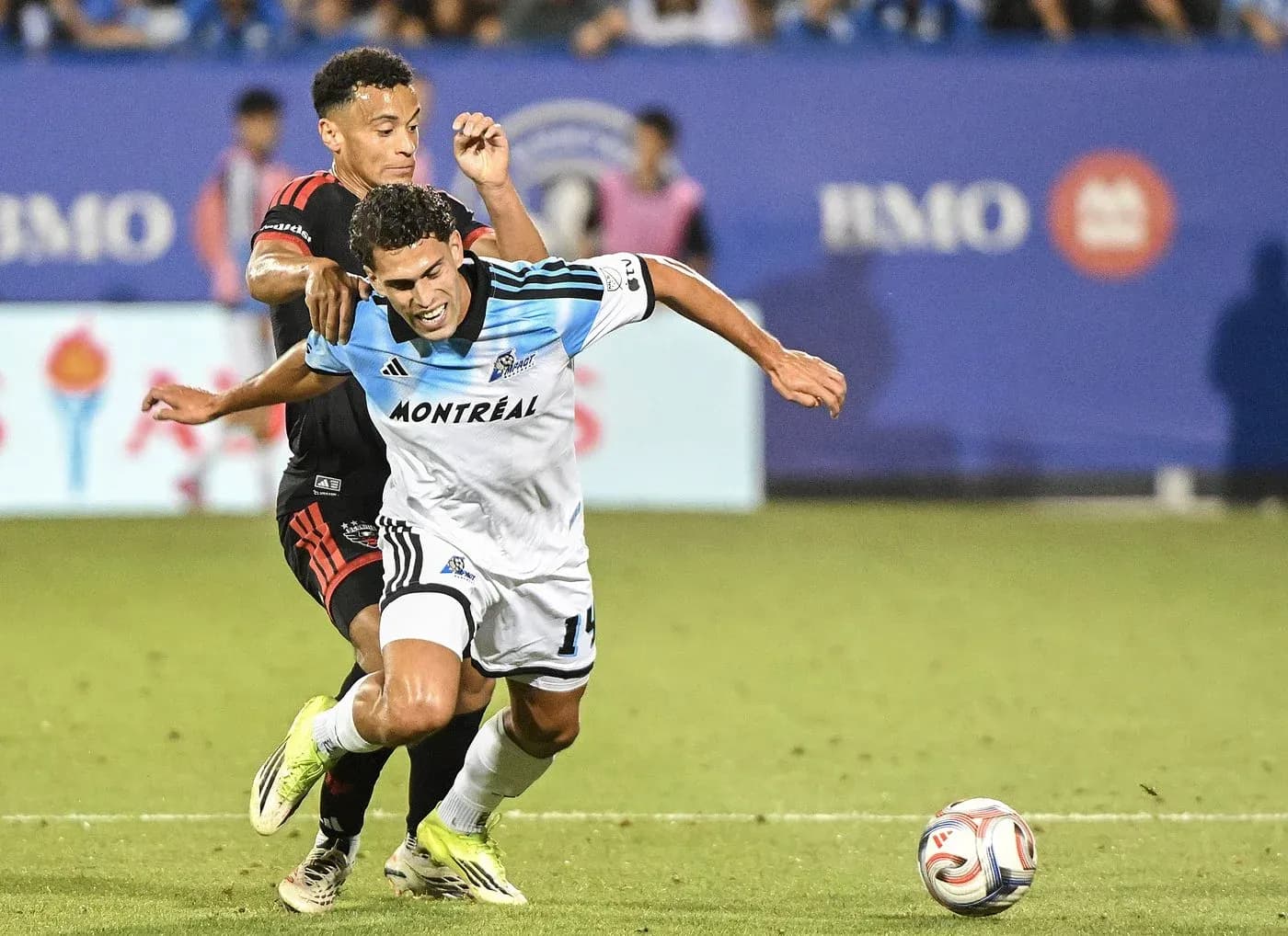 Montreal player challenged by opponent during match