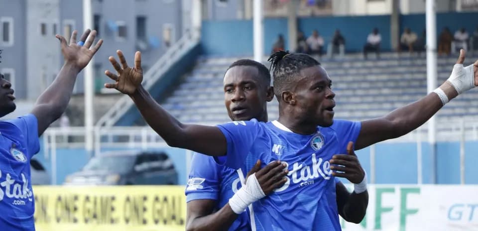 Players celebrating during Enyimba match