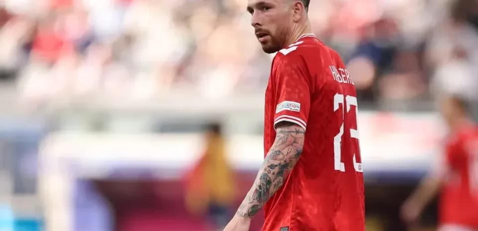 Player wearing red jersey on the field