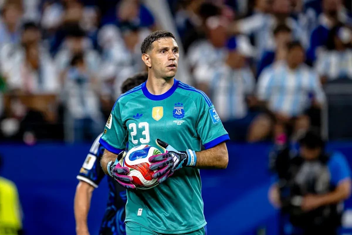 Goalkeeper holding ball during match action