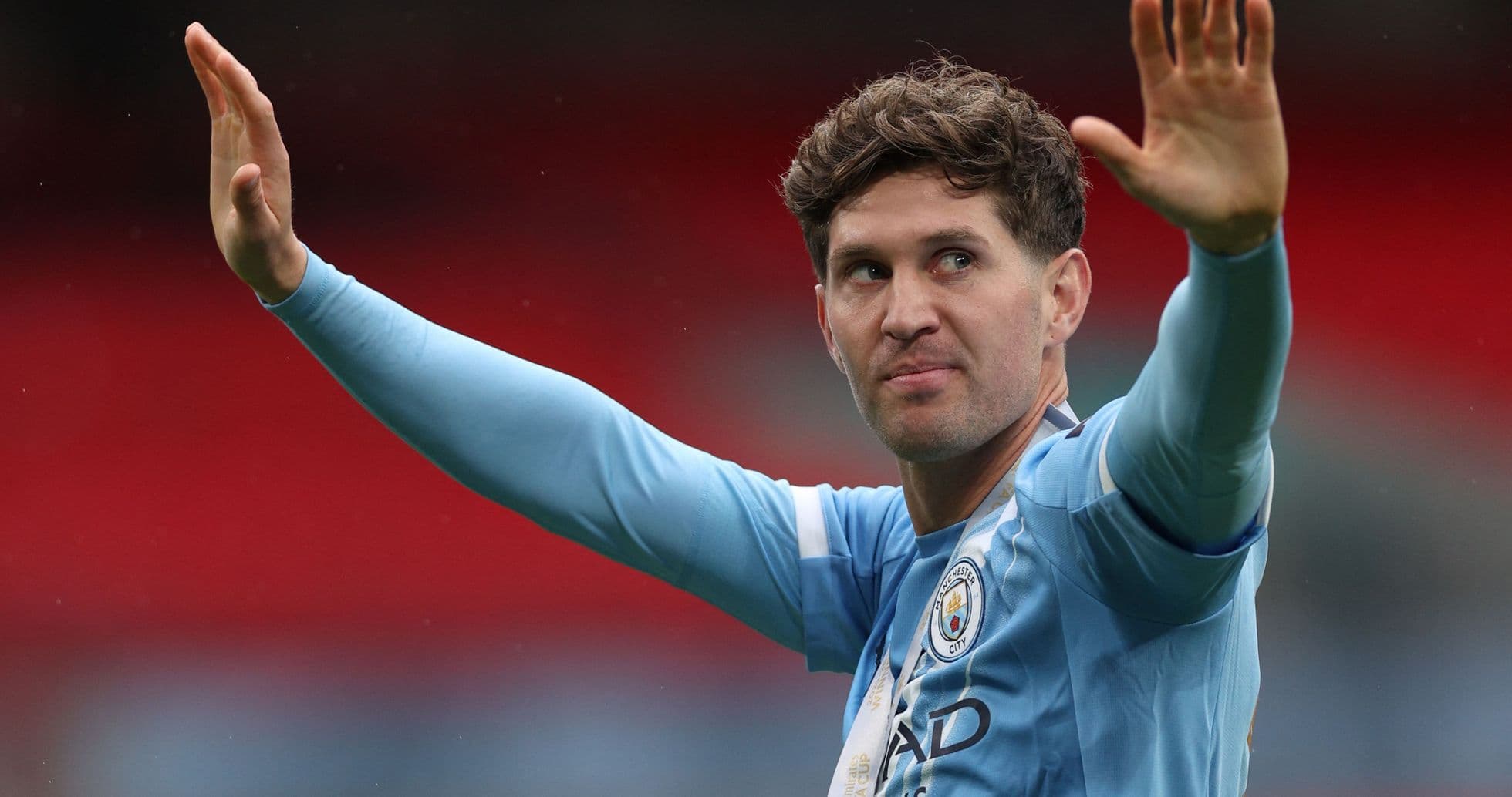 Player waving to fans during a match