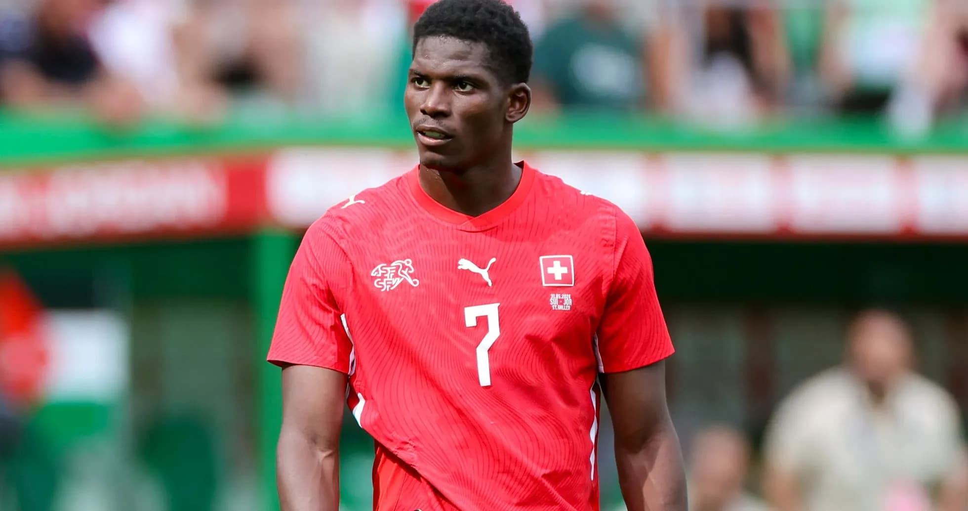 Player wearing Swiss national team jersey on field