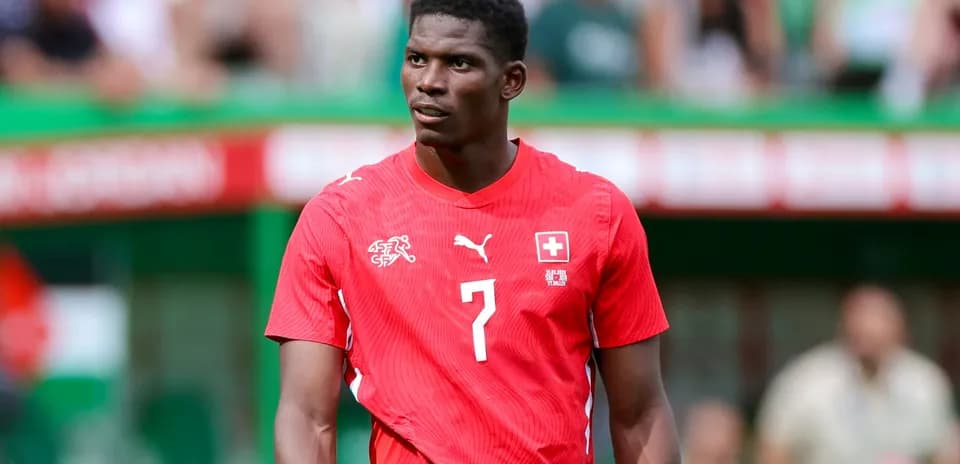 Player wearing Swiss national team jersey on field