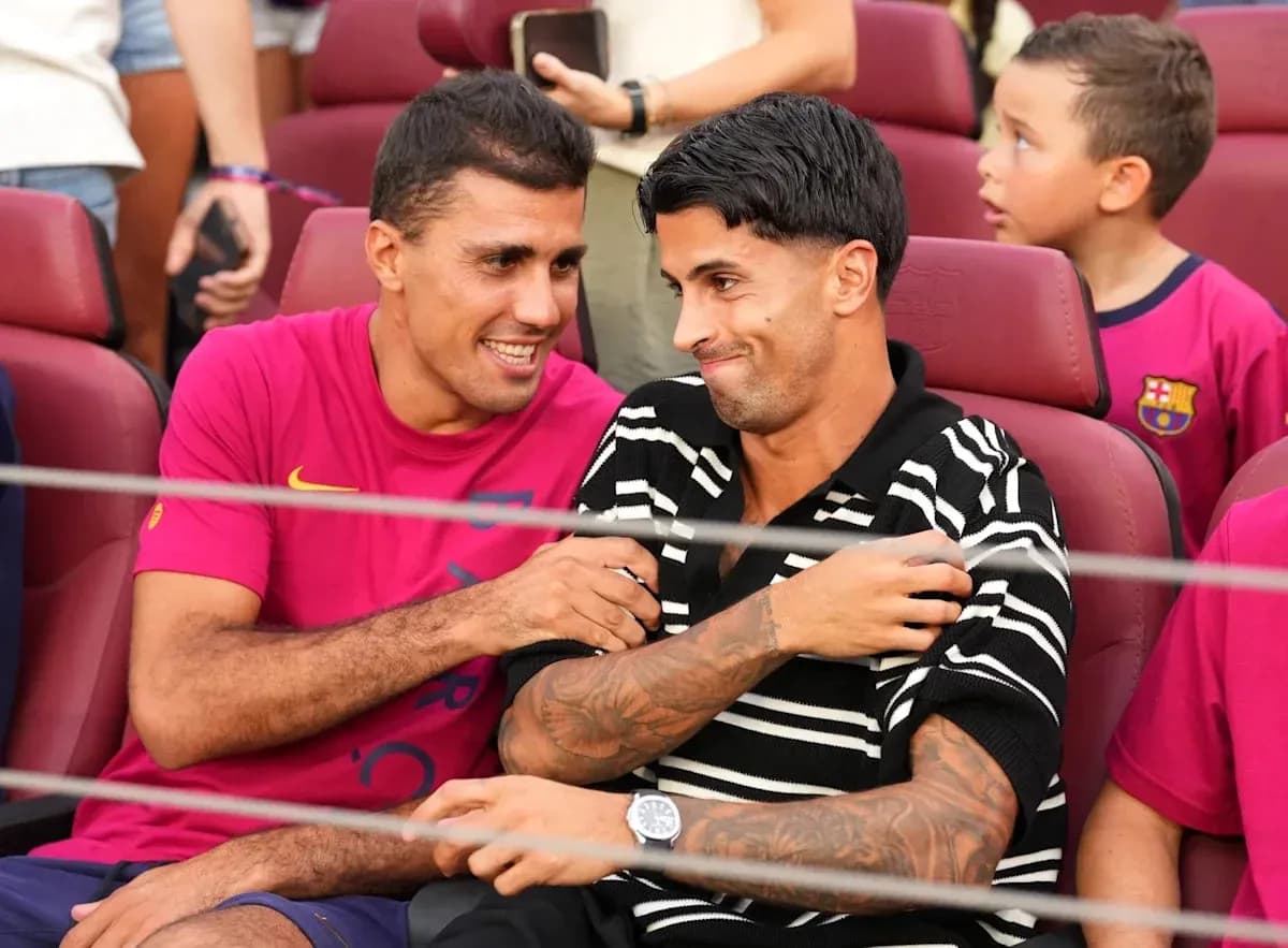 Two players interacting in stadium seats