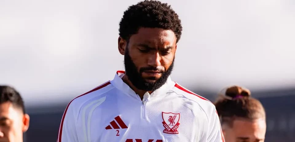 Player in Liverpool FC kit during pre-match moment