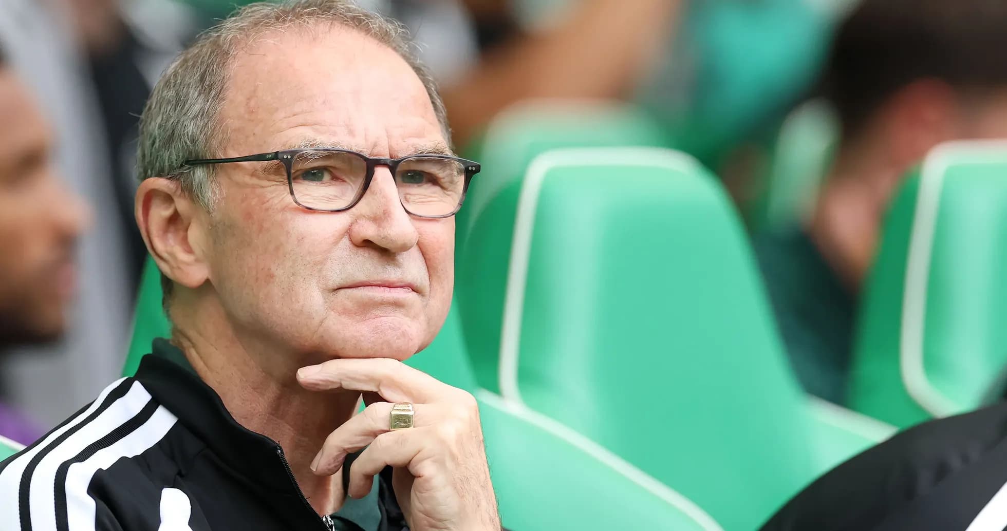 Coach observing the match from the sidelines