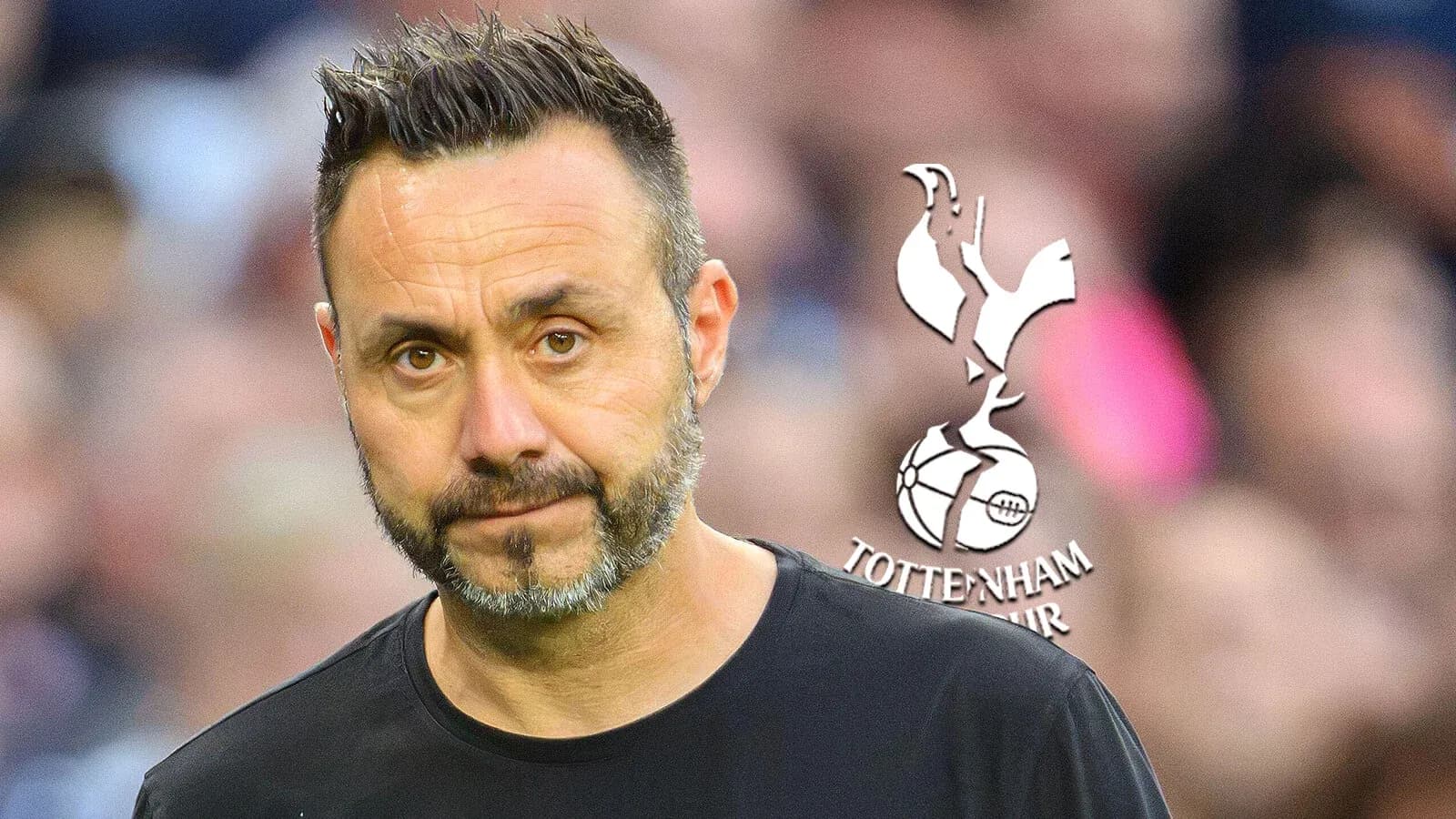 Manager looking serious with Tottenham Hotspur logo