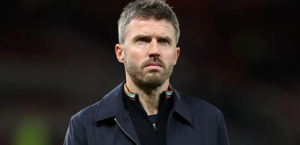 Coach standing on the sidelines during a match