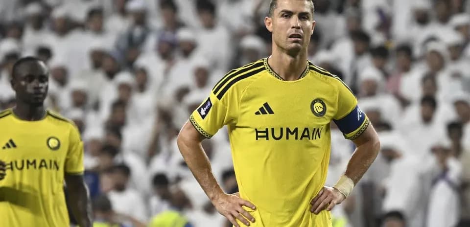 Cristiano Ronaldo in yellow kit during match