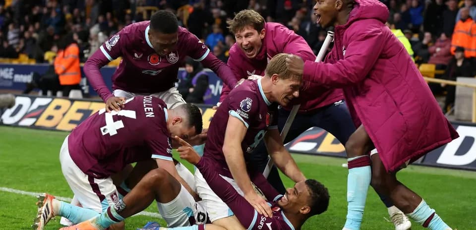 Burnley players celebrating a goal during match