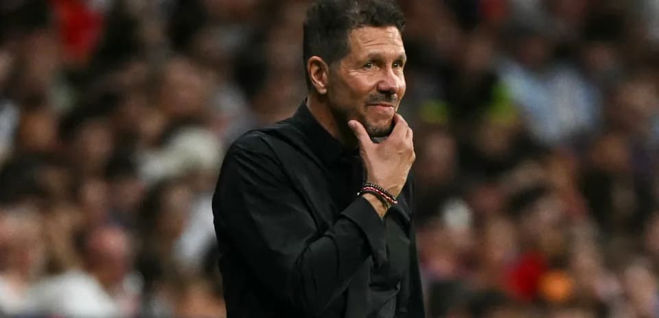 Coach observing the game during a match