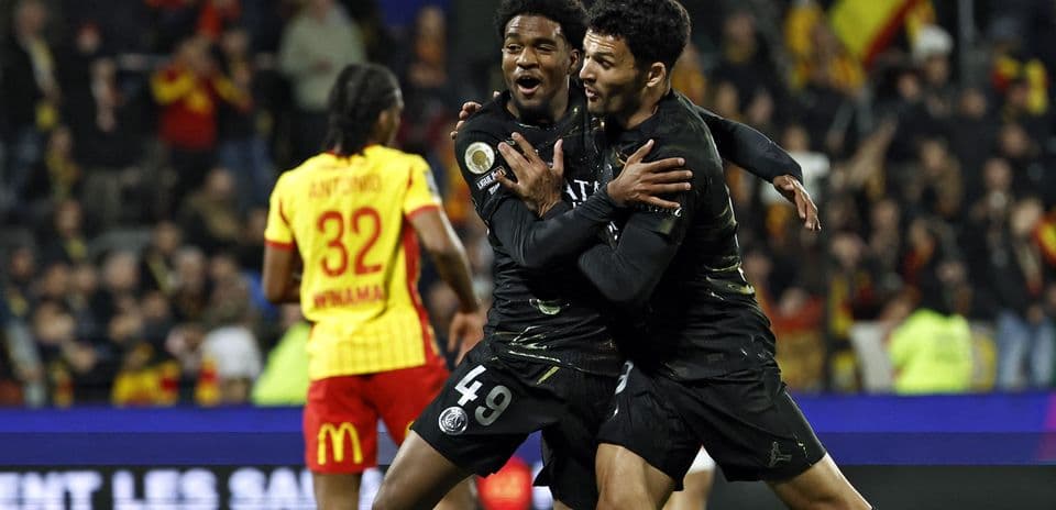 Two players celebrating a goal during match