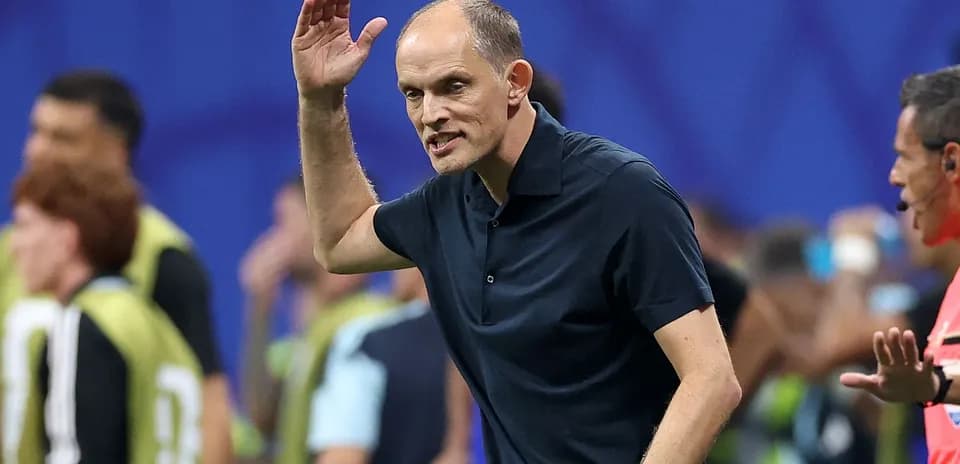 Coach gesturing during match from the sidelines