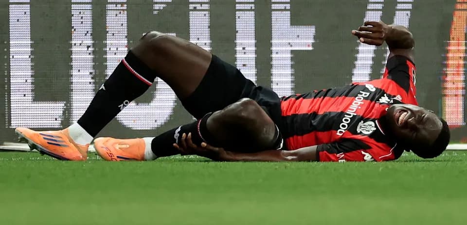 Player lying on the ground after injury during match
